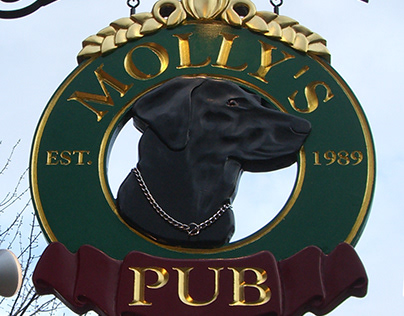 Hand carved routed gilded pub sign