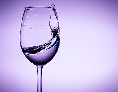Water splashes in wine glass