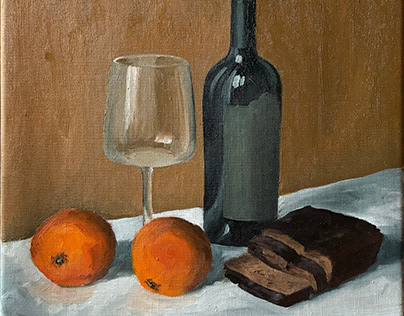 still life with rye bread and oranges
