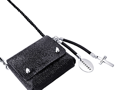 Bag with silver charms and replacement strap