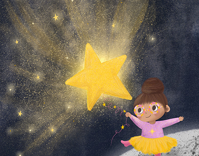 Little girl holding a star