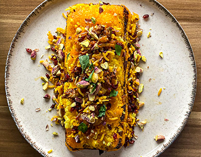 Mushroom Tahchin topped with barberries and pistachios