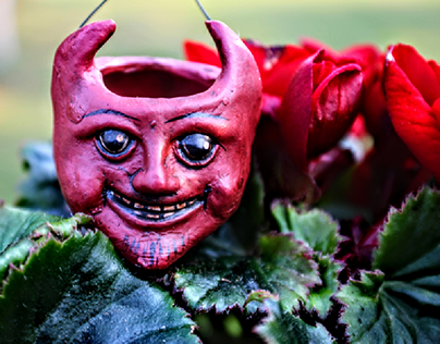 Red Devil in the flowers