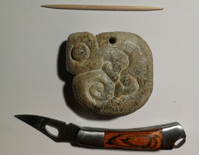 Carved stone chameleon