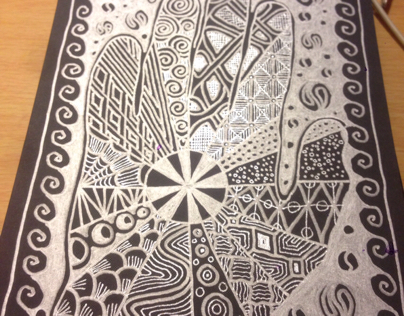 Black journal with silver pen