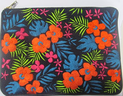 Embroidered Leather clutch..