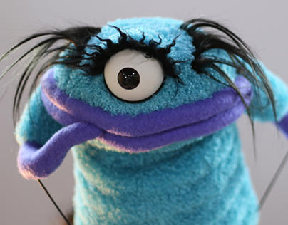 Monster puppest with animatronic eyes