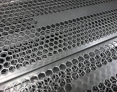 CNC punched hexagonal pattern for ventilation grille
