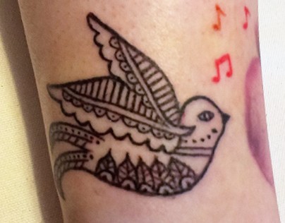 Mehendi birdie tattoo