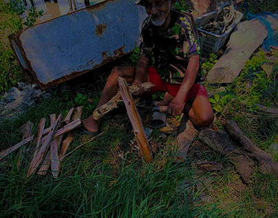 Old veteran enjoying retirement by chopping wood