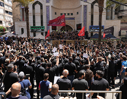 Quran in hand, Hezbollah supporters demonstrate
