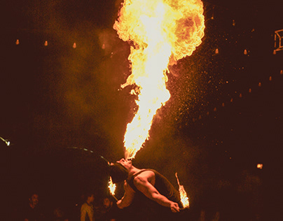 Fire show. Fire dancer dances with. Night performance.