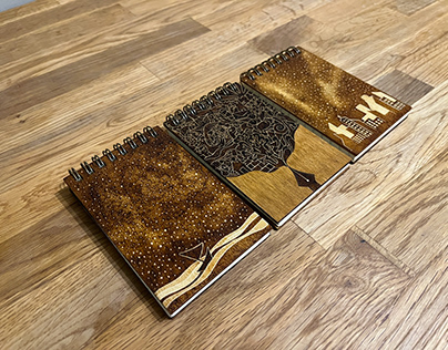 A set of small wood cover notebooks