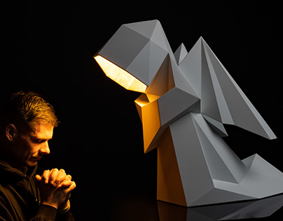 Angel lamp made of steel in a polygonal style