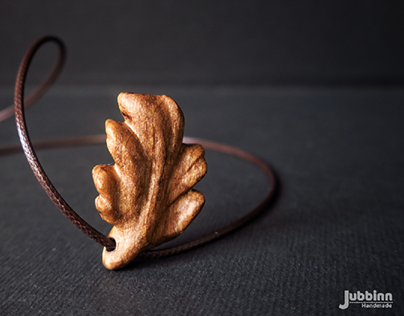 Hand carved walnut wood necklace.