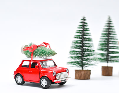 Vintage red car with Christmas tree. Stop motion