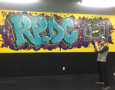 "RPDC" wall painted for a dance studio