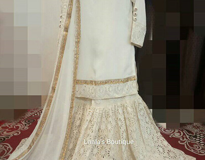 Very stylish pearl colored traditional gharara dress.
