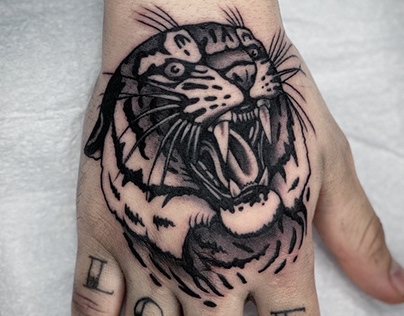 By Judd Bowman @juddbowman Tiger Club Tattoo Hawaii