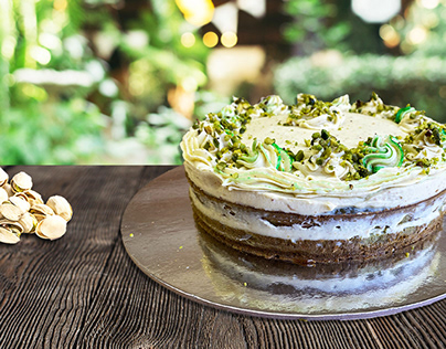 Naked cake with spinach sponges and pistachio mousse