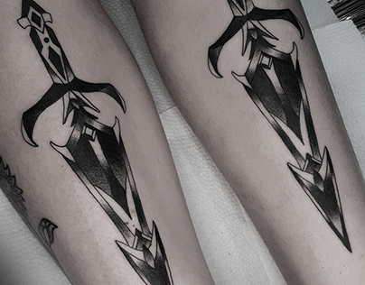 Blackwork daggers tattoo