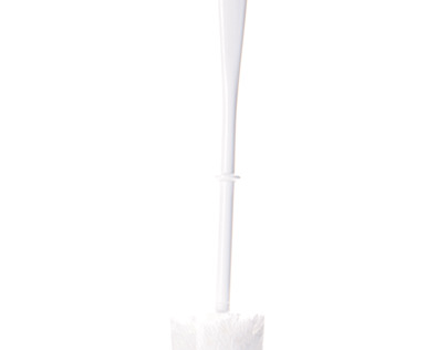 Brush for the loo in a glass - high key