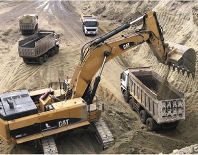 Load Dump Truck with an Excavator