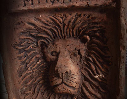hand carved brick lion