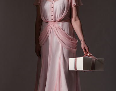 Costume designed for the lady with the cake box
