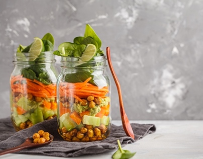 Chickpeas and vegetables salad in a jar.