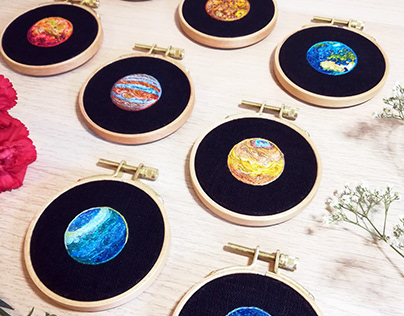 Tiny planets, hand embroideries