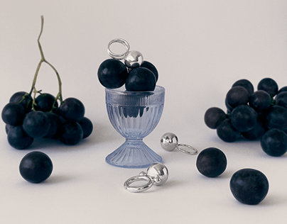 object photography of jeweler on grapes