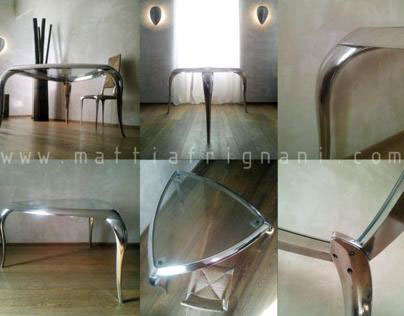 Table in casted polished aluminium and crystal