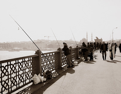 Fishermens on bridge Galata in Istanbul.