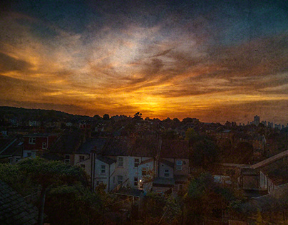 Four sunsets from the attic window