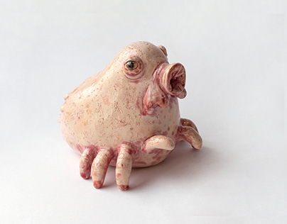 Pink creature. Ceramic sculpture