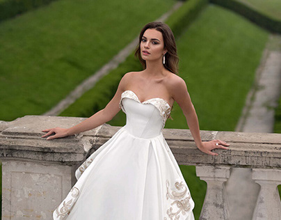 Ball gown appliqued illusion bridal gown