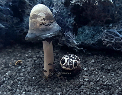 Poison dart frog and inky cap