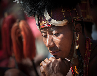 Naga Warrior in traditional warrior dress at  hornbill