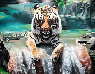 Tiger in a waterfall. Graffiti-painting of the interior