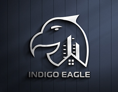 Creative Indigo Eagle Logo Design For Real Estate