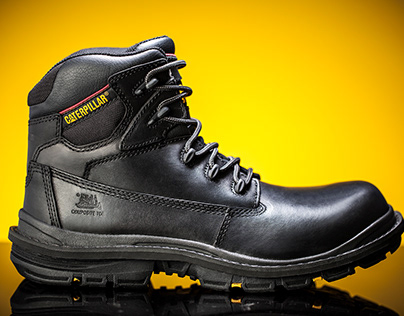 Photography of Caterpillar boots and Reebok shoes