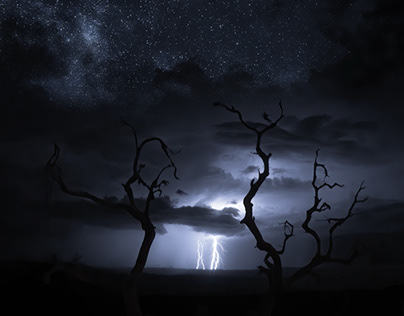 Dark starry sky and cloud thunderstorm in summer night