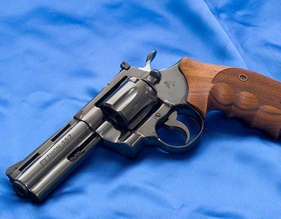 Colt Python in Royal Blue with 4" barrel and Nill grips