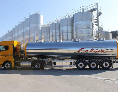 Trucks with cargo trailers transport goods