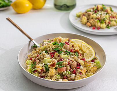 Quinoa salad with curry, red apple and pomegranate