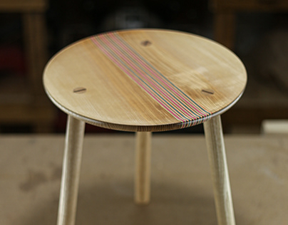 Ash wood stool with old skateboards insert