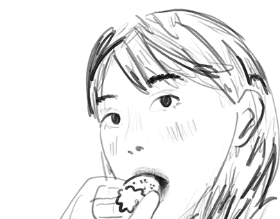 A girl enjoying the juicy sweetness of strawberries