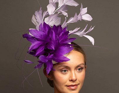 Why are fascinator hats so popular in the UK?