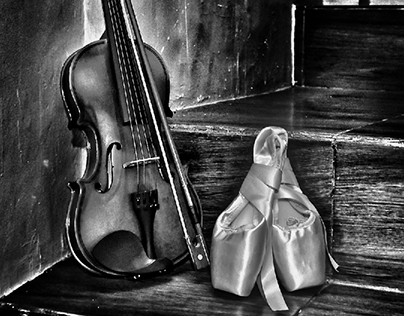 violin and pointe shoes on the stairs